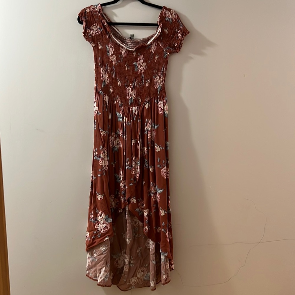 kind of a burnt orange color with flowers, size 2XL.